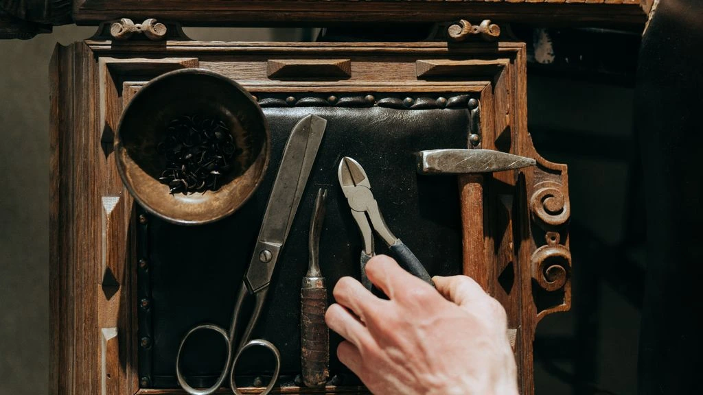 Interior of the in-house Restoration Workshop with hand tools and refinishing benches.