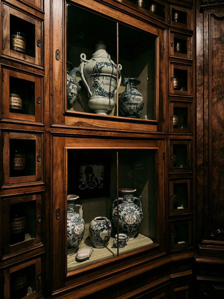 A restored 1940s oak apothecary cabinet, photographed for the Snyder's Treasures catalog